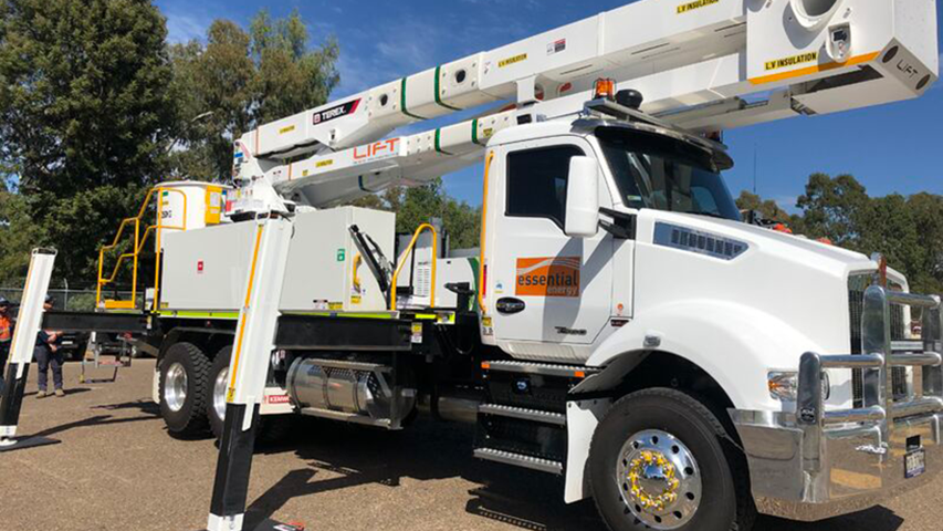 alt= image of bucket trucks made by essential energy and powered viatec smartpto, lift industries and terex