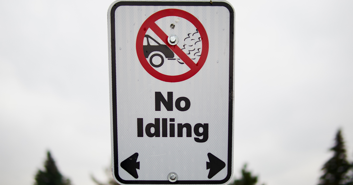 A road sign displaying 'No Idling' with a crossed-out idling car symbol, indicating a location where idling is prohibited, reflective of how many states have idling laws.